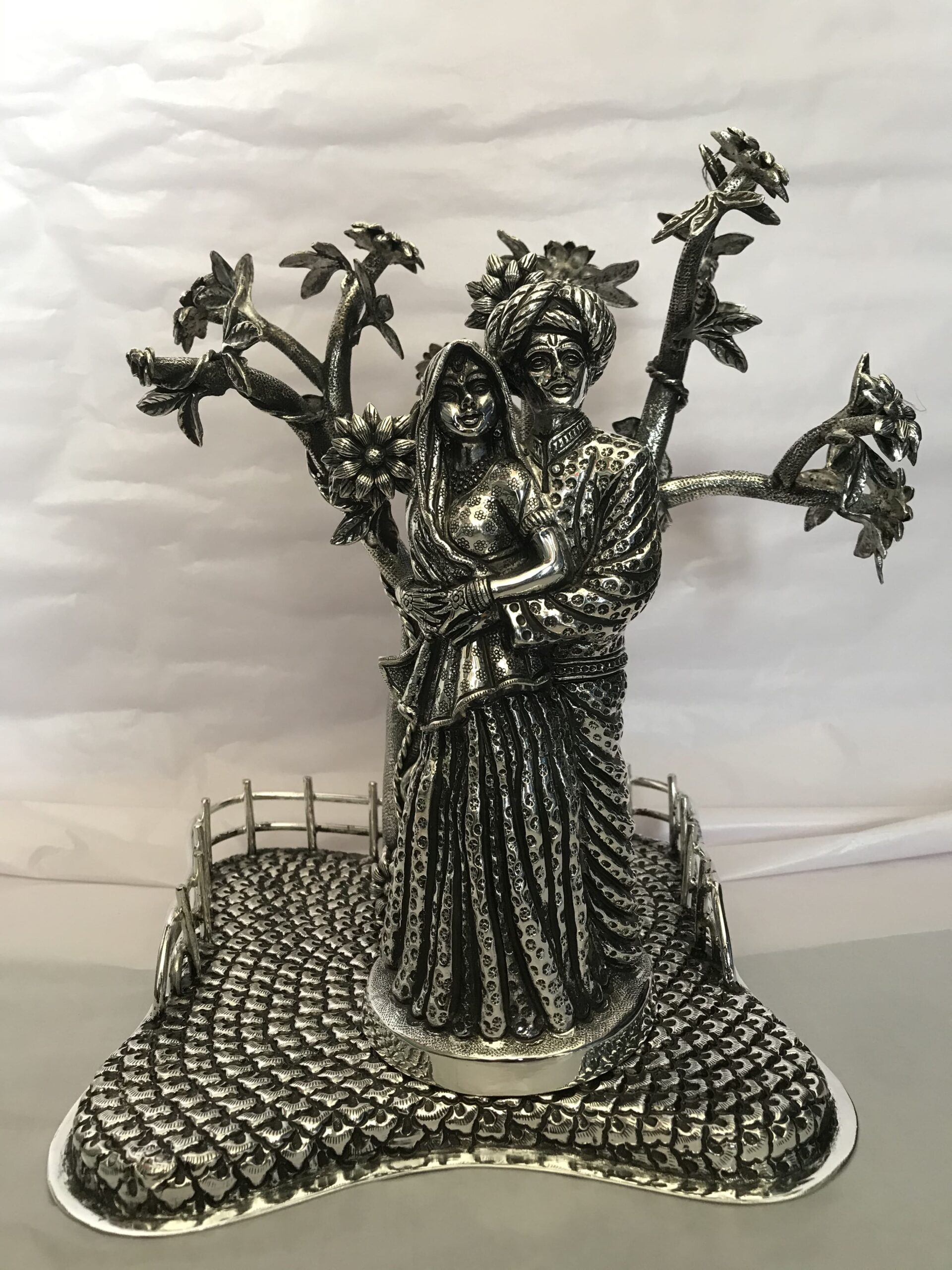 Silver statue of couple